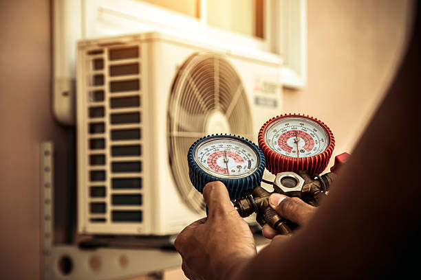 Professional Ac Installation technician working in Oakville, IN